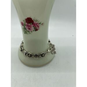 Brighton Love Reigns reversible hearts and flowers charm bracelet